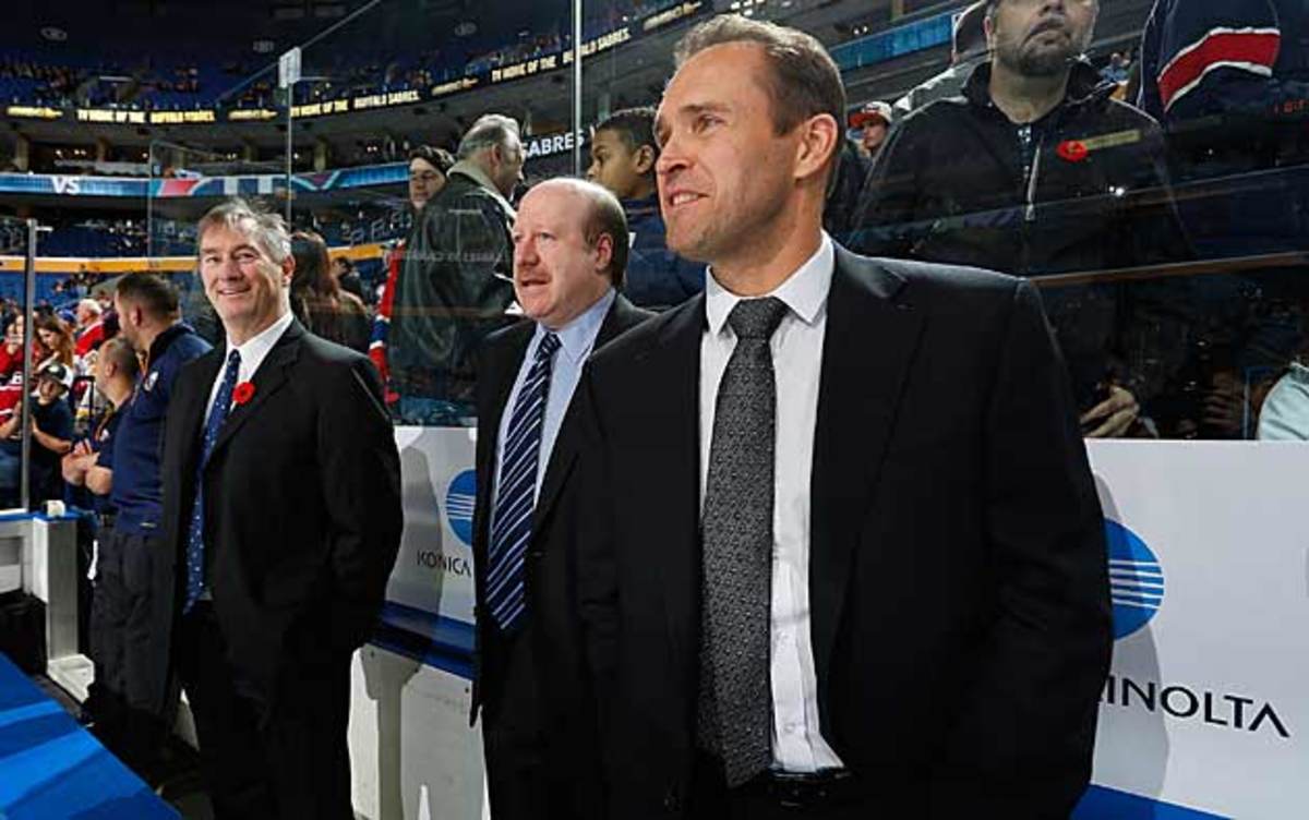 Sabres goalie coach Arturs Irbe (right) said about possibly playing, "Be careful what you wish for."